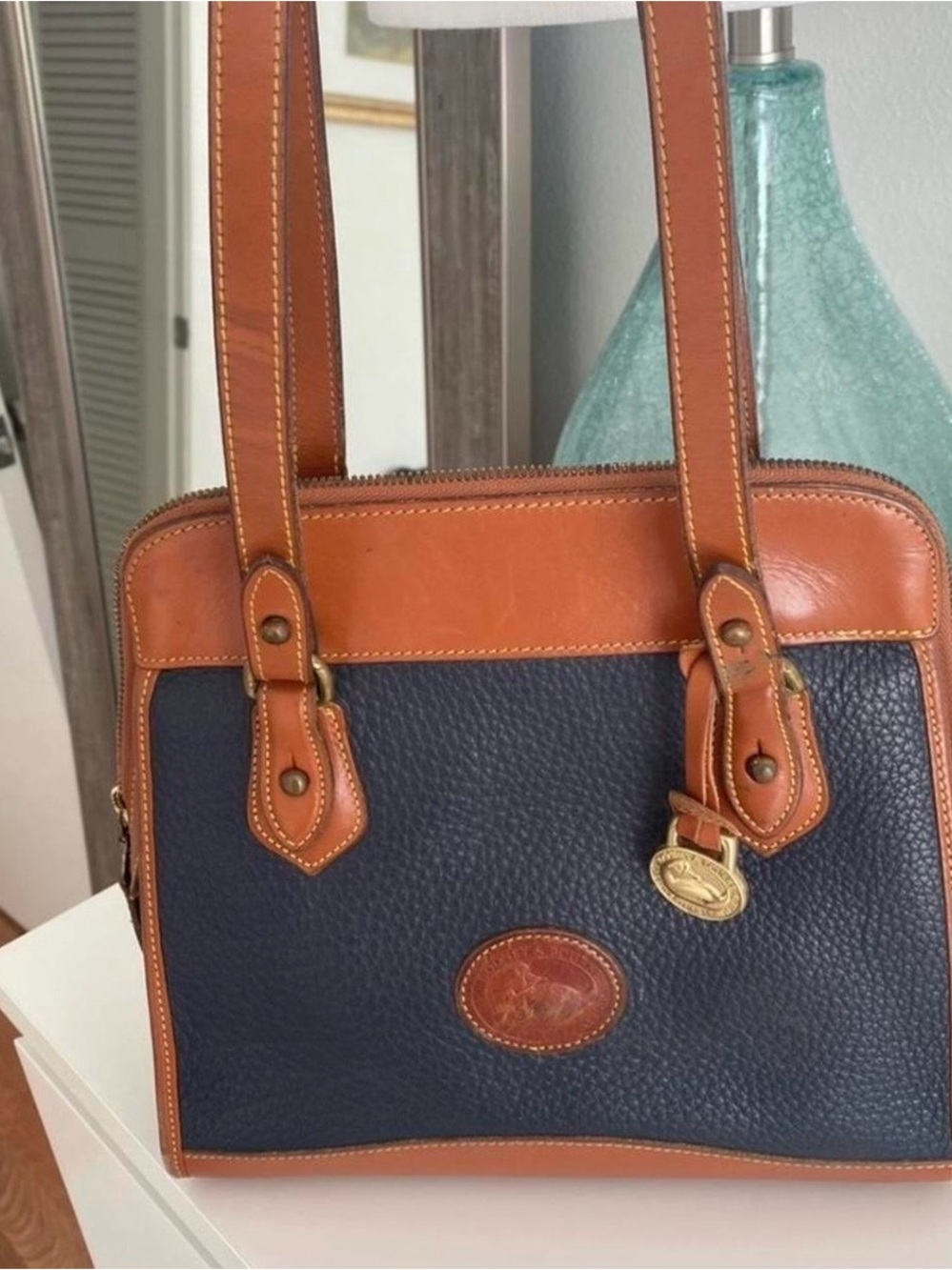 Dooney & Bourke Navy and Tan Pebbled Leather Handbag